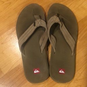 Men’s tan Quicksilver flip flops. Size 12